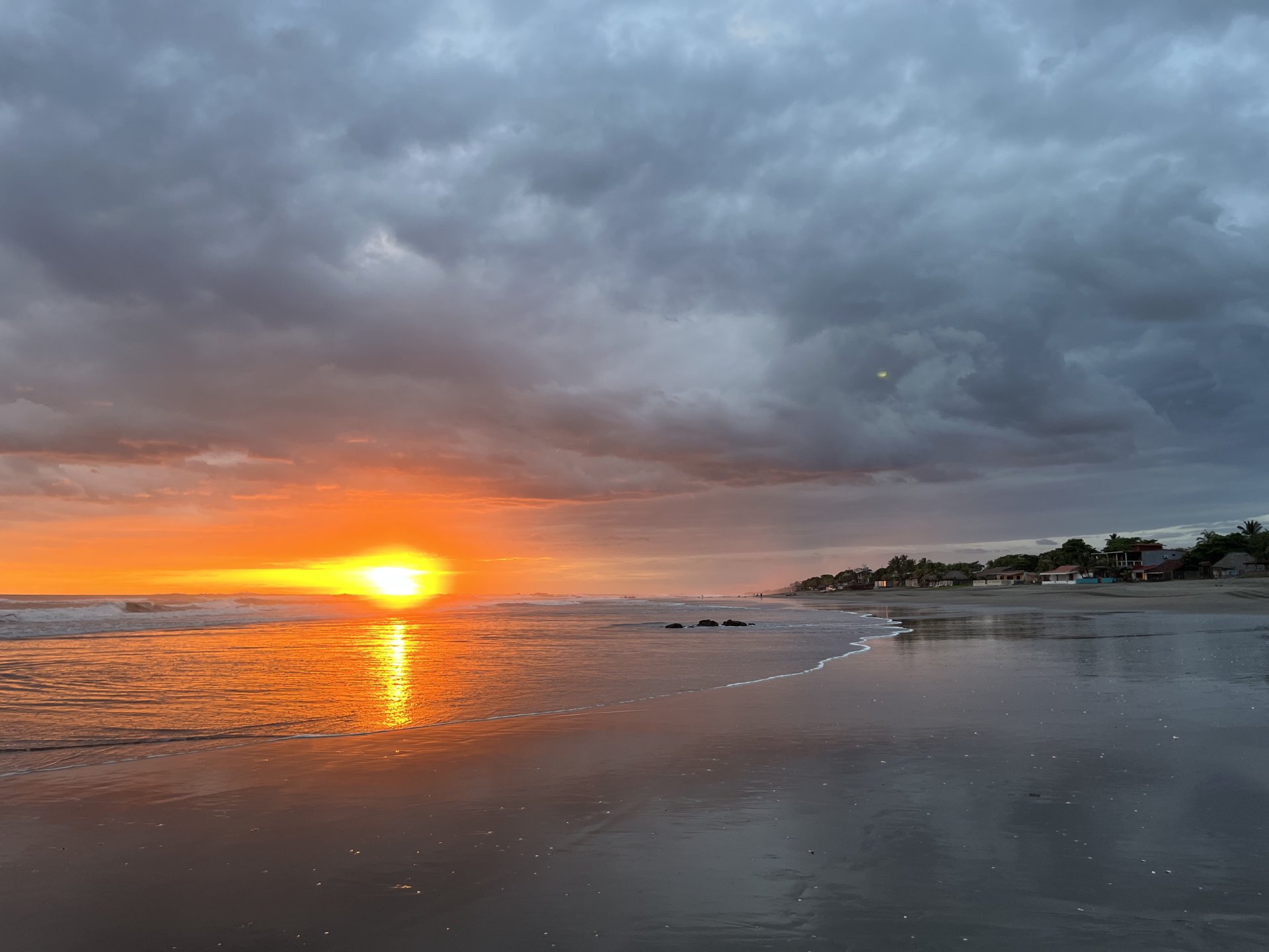 Cloudy evening sunset looking north on Playa Las Penitas